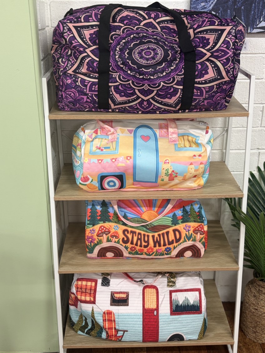 Colourful travel bags with mandala, caravan and Stay Wild designs